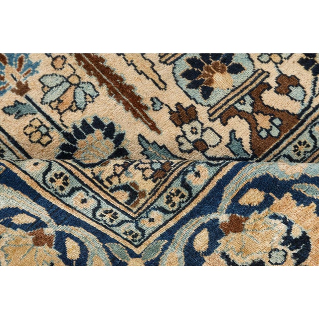 An early 20th century Persian Khorassan carpet, the beige field with an allover pattern of decorative vases, playful...