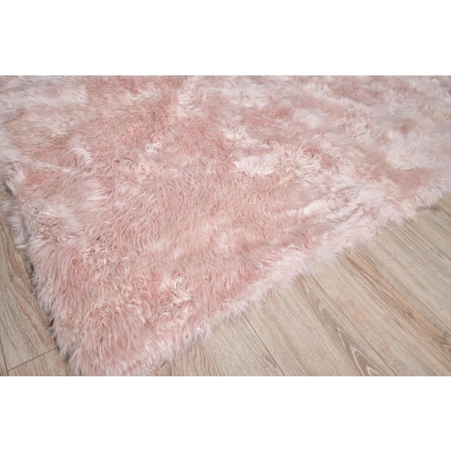 With the perfect blend of cozy and chic, the Sheepskin rug is impossible not to love. Experience the warmth and sensual...