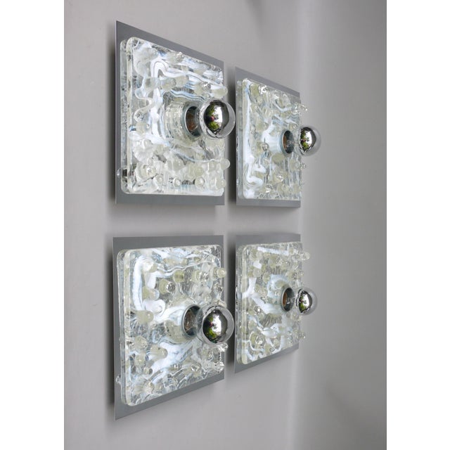 4 stylish, modern wall lights, manufactured in the 1970s, the pop art era of Sölken lights. The Murano glass creates...
