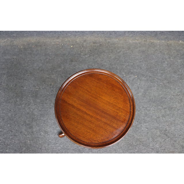 Mahogany plant stand by The Golden Gallery with round top and tripod base. Classic traditional style with turned pedestal...