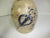 . Antique Beige handmade stoneware jug inscribed Geddes, NY. It is hand decorated with a cobalt blue floral design. This...
