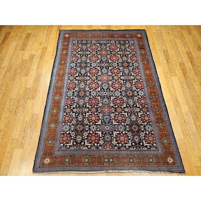 "The beautiful Persian Tabriz Afshan rug was hand-knotted in a fine workshop in the city of Tabriz during the first or...