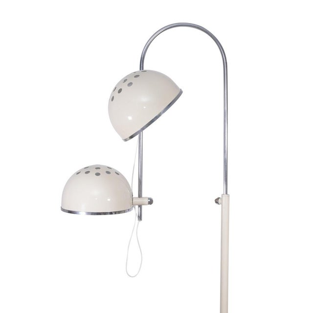 Vintage floor lamp is a design item realized by Italian Production in 1960s. Iron, Steel and Glass. Pair of 2 adjustable...