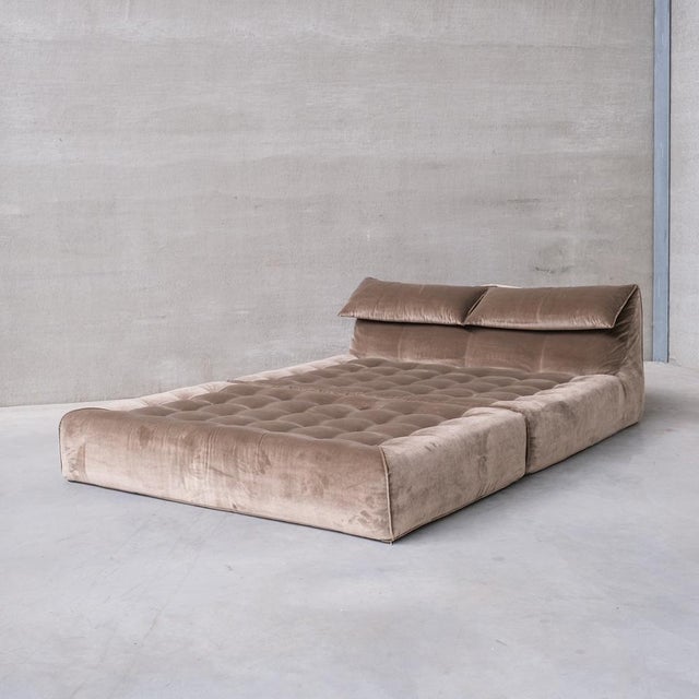 A scarce bed by mario bellini for b&b italia, le bambole model. original stamped base retained, the upholstery has been...
