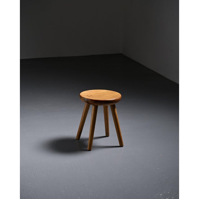 Solid pine stool designed by René Martin, a cabinetmaker nicknamed "René the Scissors," a discreet yet essential figure in...