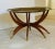 Vintage, Chinese, mahogany spider leg table with 6 legs with brass caps. The wooden base can be folded away for easy...