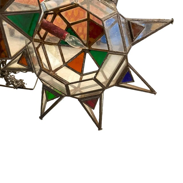 It's like making a wish on a bright star in the sky with this stunning pendant chandelier from ISLAND TRADING. The...