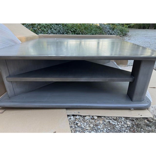 Long, sleek, and practical, the Cannello Cocktail Table's makes a striking statement in any living room. Under its warm...
