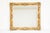 A stunning late Victorian Rococo Revival giltwood wall mirror, circa 1880–1900, featuring elaborate hand-carved scrolling...
