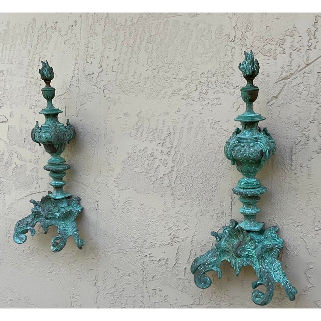 Discover a rare intersection of history and art with this exquisite pair of repurposed architectural bronze finials....
