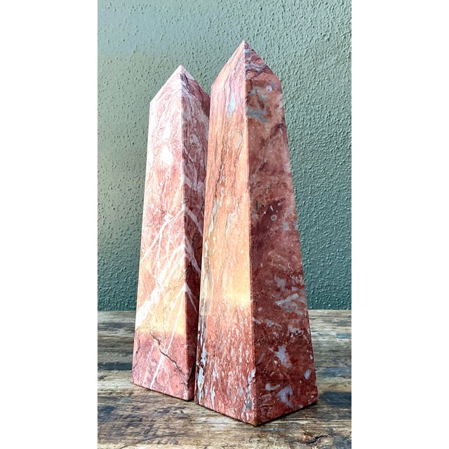 Elevate your mantel or library bookshelf with this sophisticated pair of vintage pink marble obelisks. Influenced by...