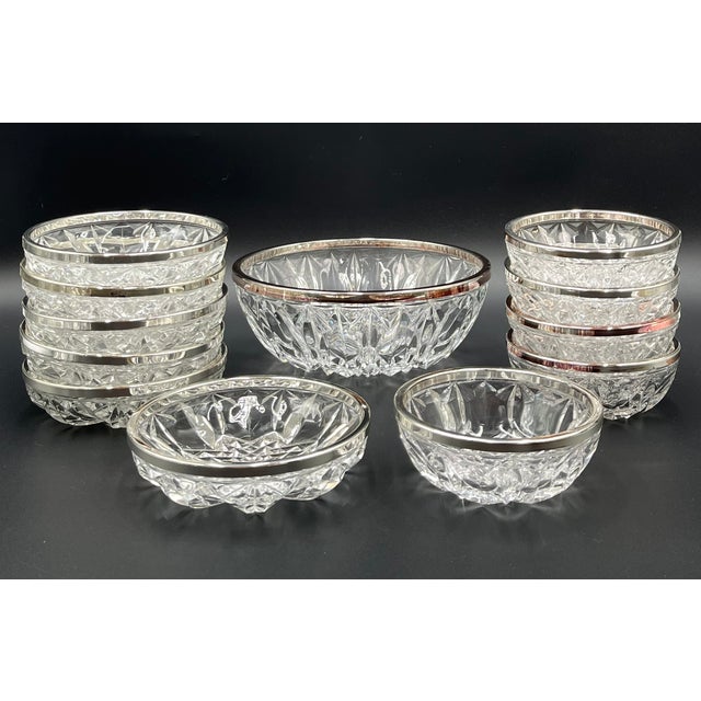 This exquisite 12-piece bowl set, crafted from cut lead crystal, captivates with its timeless elegance and superior...