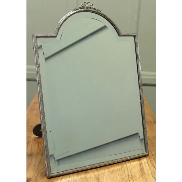 This is a beautiful easel type Toilet Mirror, it has a superb quality silver plated arched frame and very attractive lyre...
