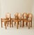 Set of 6 pine dining chairs by Danish designer Rainer Daumiller from the 1960's-1970's. These sculptural chairs are as...