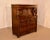 Circa 1900-1909 English oak court cupboard by Waring & Gillow. This cupboard is of tremendous quality and has a heavily...
