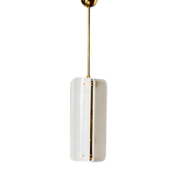 Murano glass suspension lamp with an elegant sculptural form. Each piece features hand-blown glass panels with a satin...