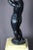 "Cast iron statue signed Jean Jacques DUCEL (1801-1877)" Iron cast iron statue of a putto raised arms supporting a basin....