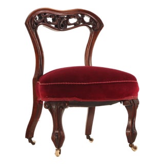 An Antique Victorian Carved Walnut Boudoir Chair, 19th Century. For Sale