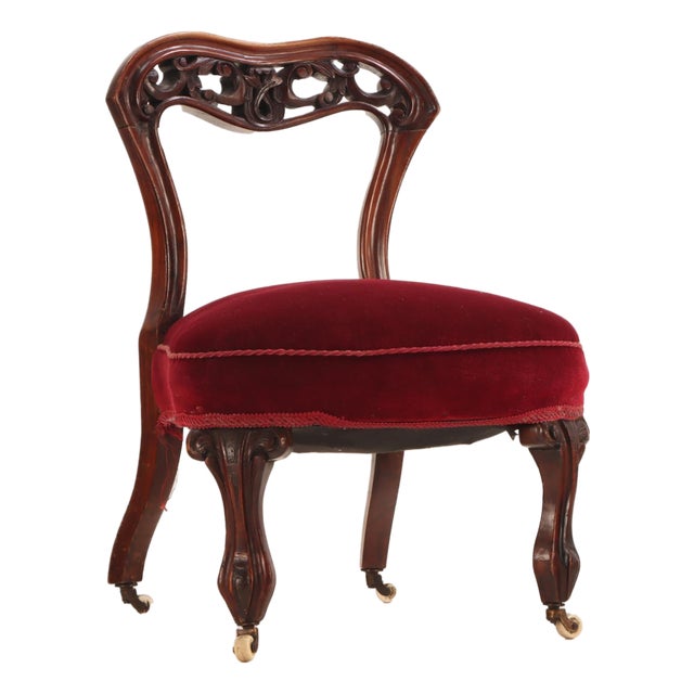 An Antique Victorian Carved Walnut Boudoir Chair, 19th Century. For Sale