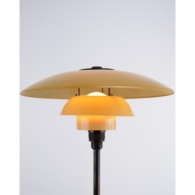 Ph 3/2 table lamp designed by poul henningsen and produced by louis poulsen in the 1930s. The lamp is made with single-...