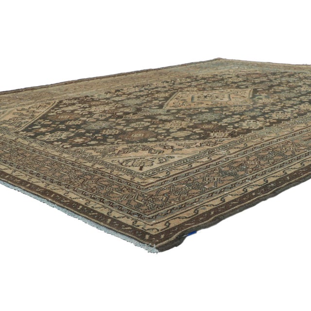 61007 Distressed Vintage Persian Hamadan Rug, 06'10 x 09'07. Luxury lodge meets relaxed refinement in this hand knotted...