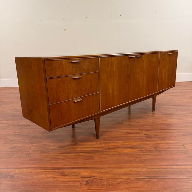 Vintage mid-century teak sideboard by A.H. McIntosh & Co of Kirkcaldy Scotland circa 1960's, a rare early version of the...