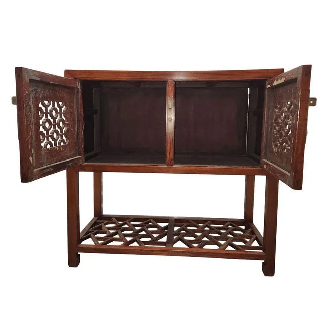 Shanghai mid to late 1800's Qing dynasty sideboard cabinet. Jumu (Chinese elm wood) Dimensions 38" x 19" x 36" The doors...