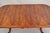 Reproduction Chippendale Style Flame Mahogany Ball and Claw Dining Room Table with 2 Extension Leaves. Item features a...