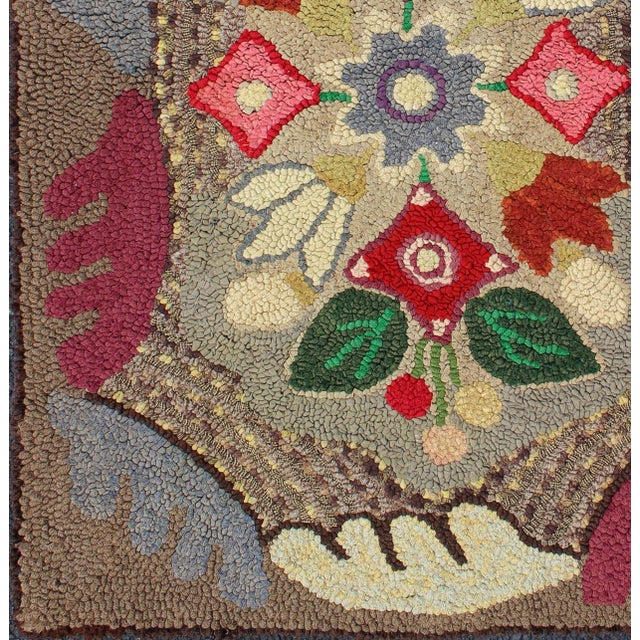 Colorful and gorgeous American hooked rug with gray soft red, rose, green, light brown, lavender, green, and yellow...