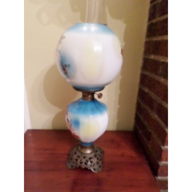 This is a Very Rare Antique Victorian 20 " tall Porcelain / Glass Gone with the Wind Lamp with Ornate Brass Base with Hand...