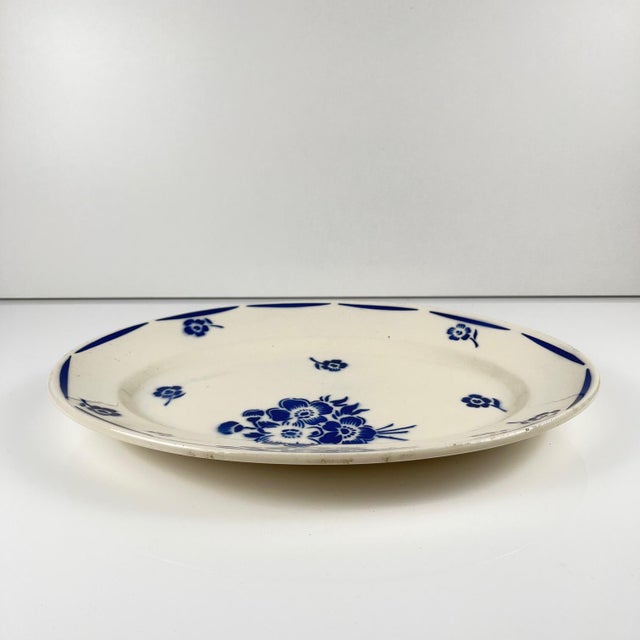 Oval dish, semi-porcelain, Badonviller, blue floral pattern, early 20th century Dimensions: 32.5 x 22.5 cm Total height:...