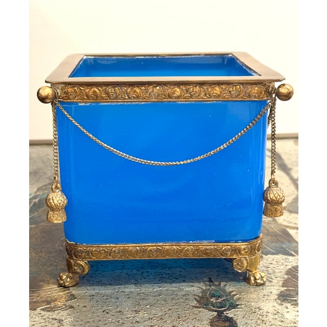 Large Antique French blue Opaline Glass Jardiniere/Cache Pot. Dore Bronze Mounts. Each side features a tassel and chains....