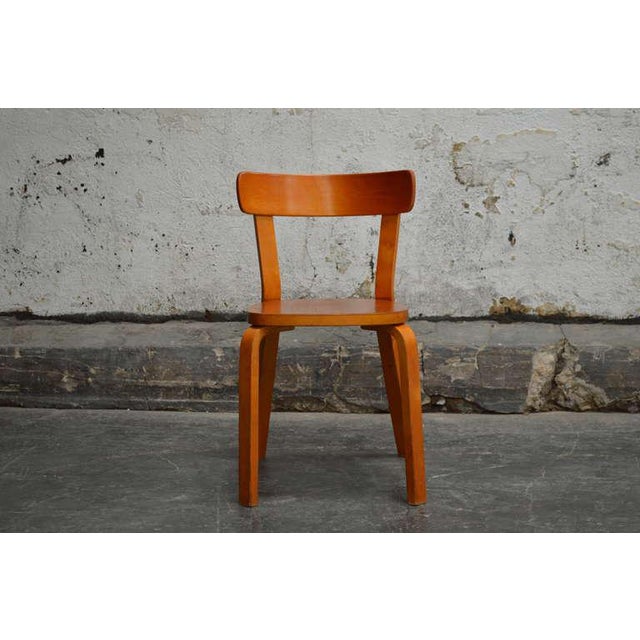 Beautiful Alvar Aalto bent wood birch side chairs designed circa 1940's. Unlike Thonet, Alvar Aalto did not bend the wood...