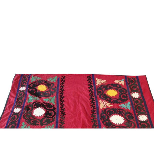 Antique Uzbek Suzani, bold bright colors. All wool. made Circa 1920 Size : 5'4"x6'10". This is a one of a kind rug. We...