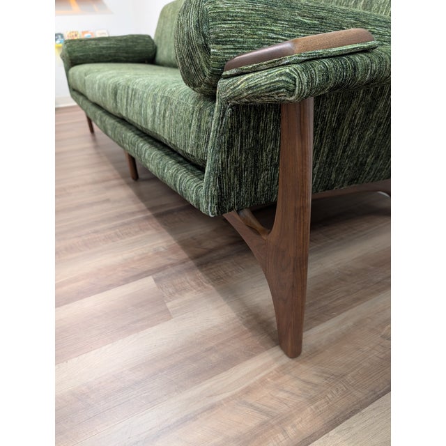 Adrian Pearsall was known for his sculptural furniture designs both with tables and upholstered furniture. There is not a...