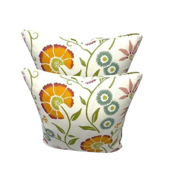 Add a cheerful touch to your space with this vibrant throw pillows! Featuring a beautiful floral embroidery in warm tones...