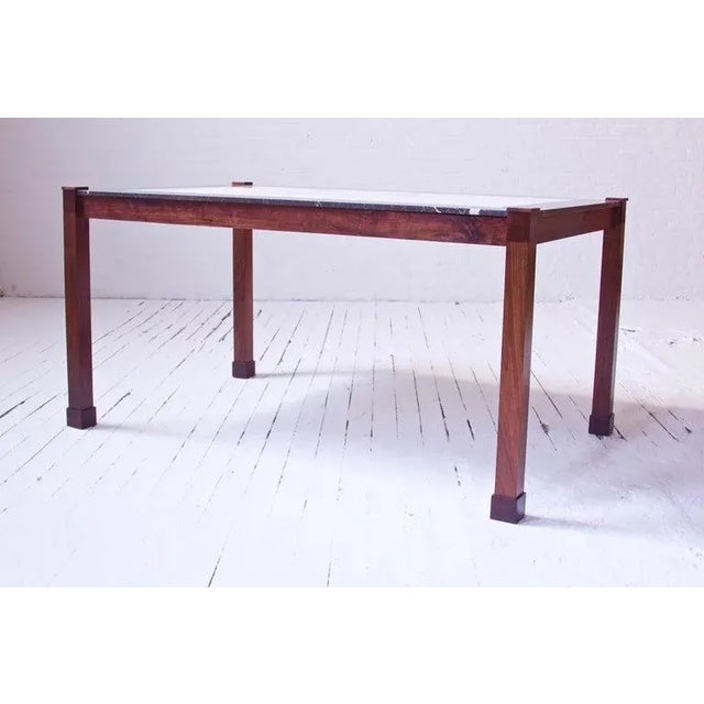 "San Miniato" walnut & two-tone marble dining table by Montaperto Studios, 2021. An explorative and experimental form,...