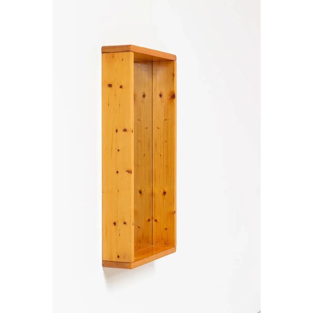 Wooden mirror designed by Maison Regain. Circa 1970 in France. Rectangular frame with rectangular mirror. This piece is...