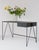 This Study desk is made with a black powder-coated steel frame and a black linoleum top made from all-natural ingredients,...