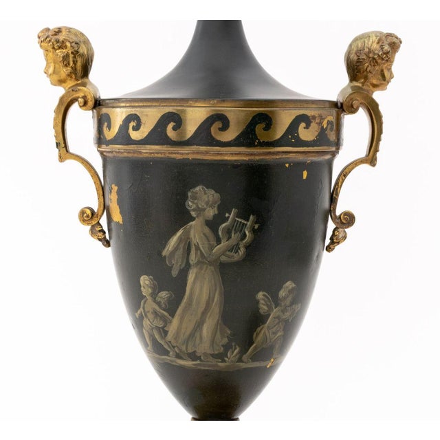 French Empire Style Painted and Gilt Metal Two Handled Urn Form Table Lamp, with Neoclassical figural scene, masque head...
