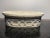 Beautiful off-white oval limestone decorative piece with intricate architectural design carefully pieced on wrapping...