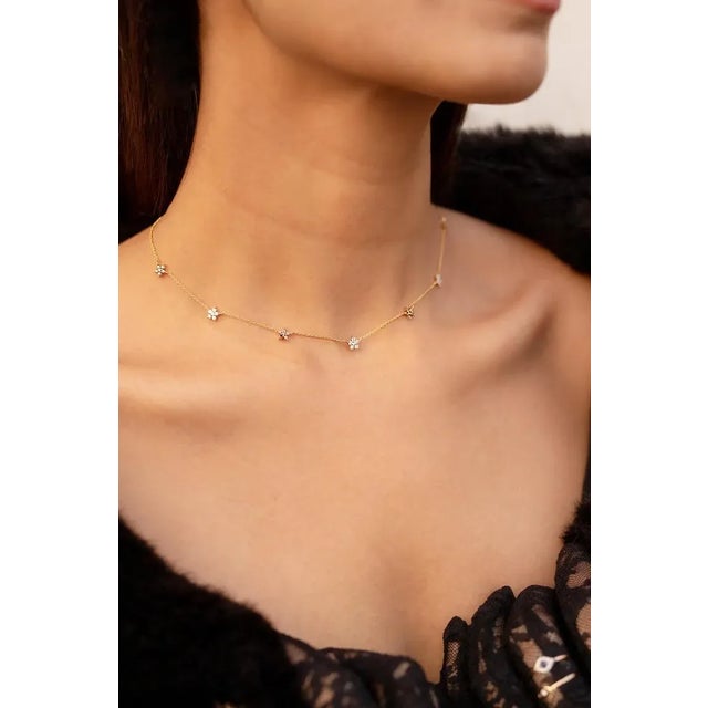 Diamond Necklace in 14K Gold studded with round cut brown and white diamonds. Accessorize your look with this elegant...