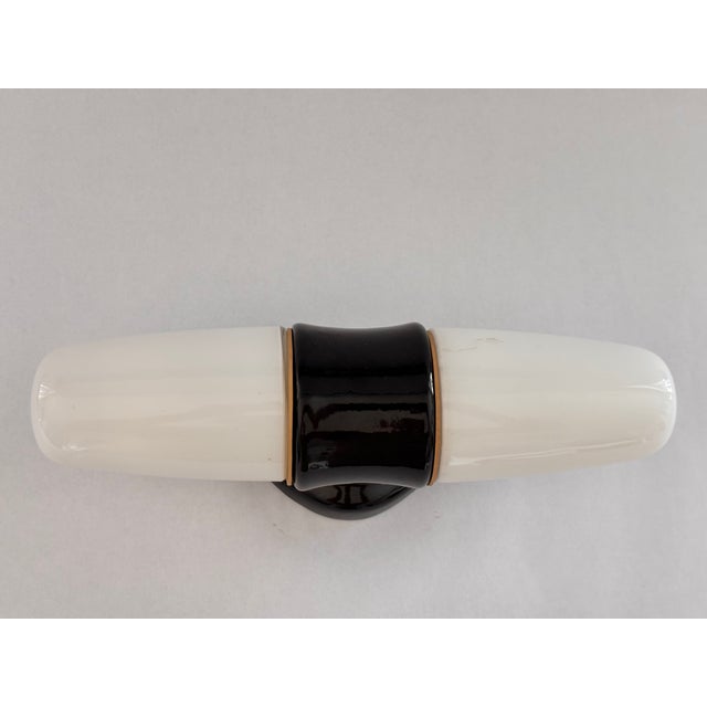 Model 6066 Sconce in Ceramic by Wilhelm Wagenfeld for Lindner, 1950s, in Very Good conditions. Designed 1950 to 1959 This...