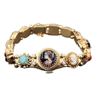 1950s 14k Yellow Gold Slide Charm Omega Gemstone Bracelet Watch For Sale
