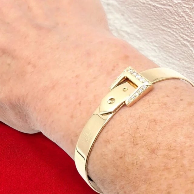 Hermès 18k Yellow Gold Diamond Buckle Bangle Bracelet Details: Metal: 18k Yellow Gold Length: 6.5" Weight: 22.1 grams...