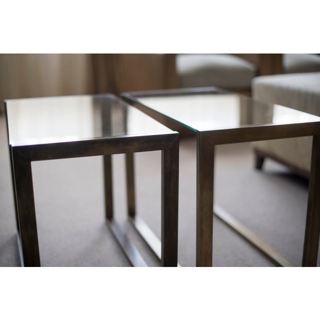 This is a pair of glass and brass side tables in the style of 1950s. They are a perfect match in any contemporary or...