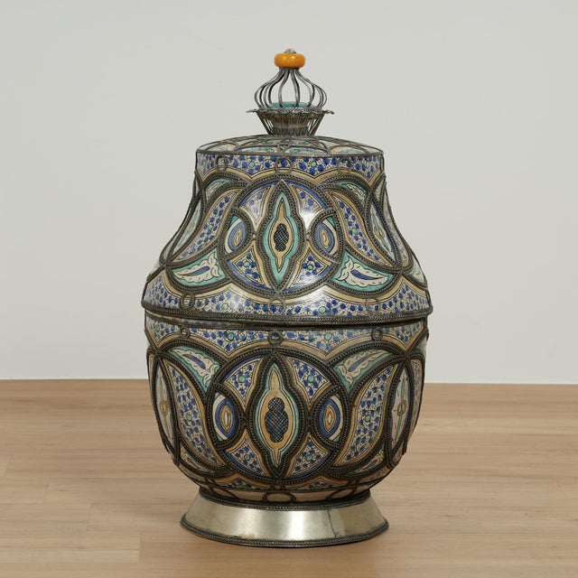 Impressive large pair of Moroccan lidded urns crafted in terra cotta and hand decorated in distinctive Mediterranean...