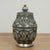 Impressive large pair of Moroccan lidded urns crafted in terra cotta and hand decorated in distinctive Mediterranean...