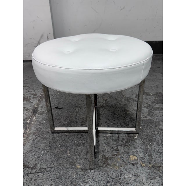 Design Plus Gallery presents an Ottoman from Unknown Brand. This ottoman features a crisp white faux leather upholstered...