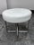 Design Plus Gallery presents an Ottoman from Unknown Brand. This ottoman features a crisp white faux leather upholstered...
